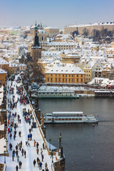 Naklejka premium Karlov or Charles bridge in Prague in winter