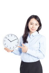 時計を指差す女性