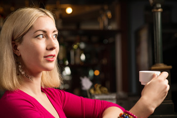 woman with a cup of coffee