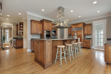 Kitchen with wood and granite center island