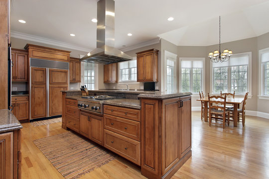 Kitchen with wood and granite center island