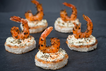 festive appetizer with spicy shrimps on toast