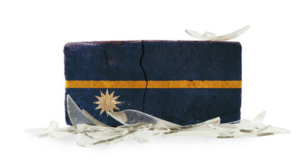 Brick with broken glass, violence concept