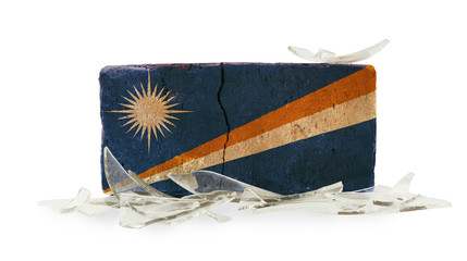 Brick with broken glass, violence concept