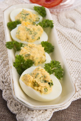Stuffed eggs with parsley and mayonnaise