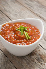 tomato sauce on wooden background