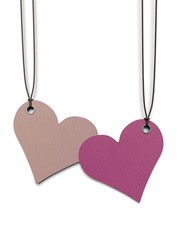 two heart shaped paper tags