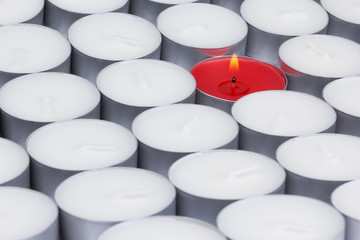 lots of white candles and one red