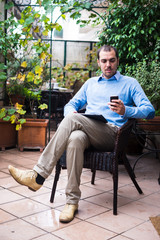 Fototapeta premium elegant business multitasking multimedia man at home