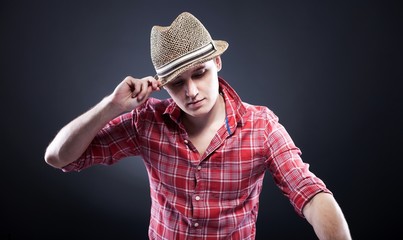 Young man with straw hat