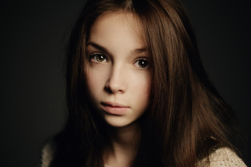 Fototapeta premium young beautiful girl studio portrait