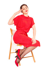 Girl in a red dress on white background