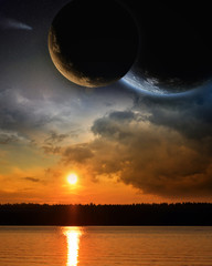 Fototapeta na wymiar Planet in space sunset clouds evening lake