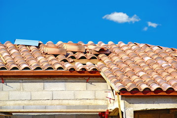 Pose de tuiles à emboîtement