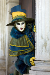 Venetian costume attends Carnival of Venice.