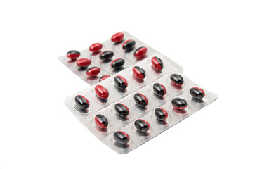 Medicine pills packed in blisters isolated