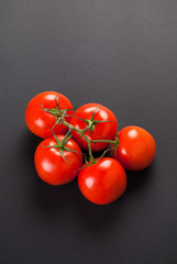 Tomatoes on a black background