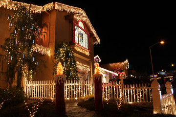 Decorated house with christmas lights - 58573228