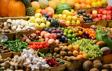 Fruit market with various colorful fresh fruits and vegetables - - 58575252