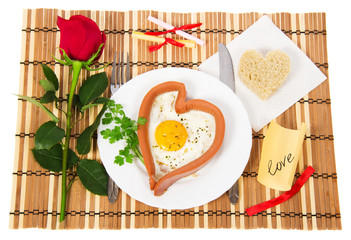 fried eggs in a heart