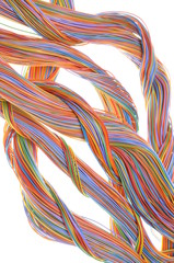 Swirl of computer network cables isolated on white background 