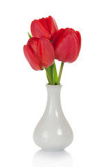 Beautiful red tulips in vase