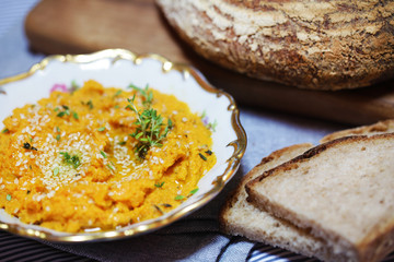 Carrot and sweet potato spread or dip with sliced bread - 58578888