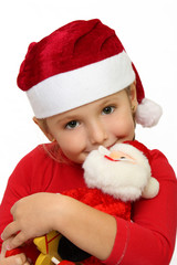 Bambina che abbraccia Babbo Natale
