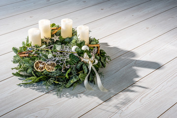 Advent wreath with white candles