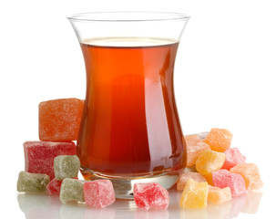 glass of Turkish tea and rahat Delight, isolated on white