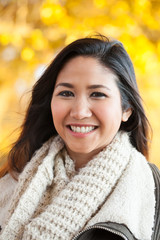 Young Asian woman outdoor autumn portrait