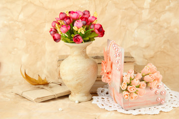 Beautiful still life with vintage casket and flowers