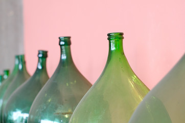 Old green bottles for wine making.