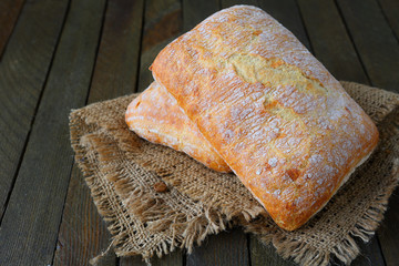 Two freshly baked ciabatta
