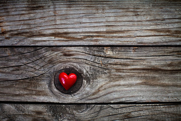 Valentines Day background with heart on wooden desk