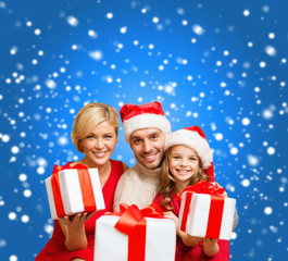 smiling family giving many gift boxes