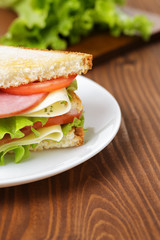 toasted sandwich with ham, cheese and vegetables