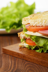 toasted sandwich with ham, cheese and vegetables