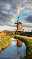 Fototapeta premium Windmills in Zaanse Schans, Amsterdam, Holland