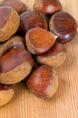 chestnuts on wood