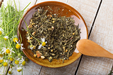 Obraz premium Dry herbal tea on plate