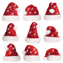 Rote Nikolausmützen - red santa hats isolated