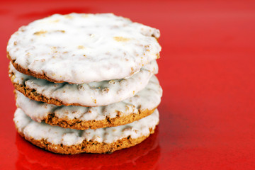 Frosted cookies on red
