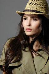 Portrait of young girl in hat