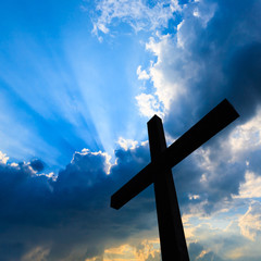 Cross silhouette and the holy blue sky