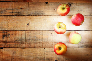apples on wooden table