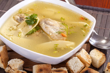 homemade chicken soup with pasta and vegetables