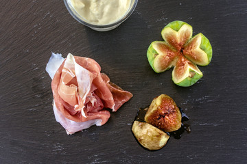 raw parma ham and figs