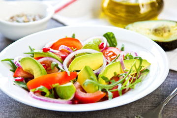 Avocado with Pomegranate and Rocket salad