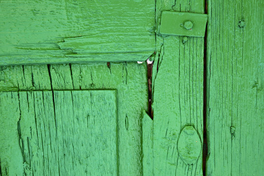 piece of colorated green wood as a window
